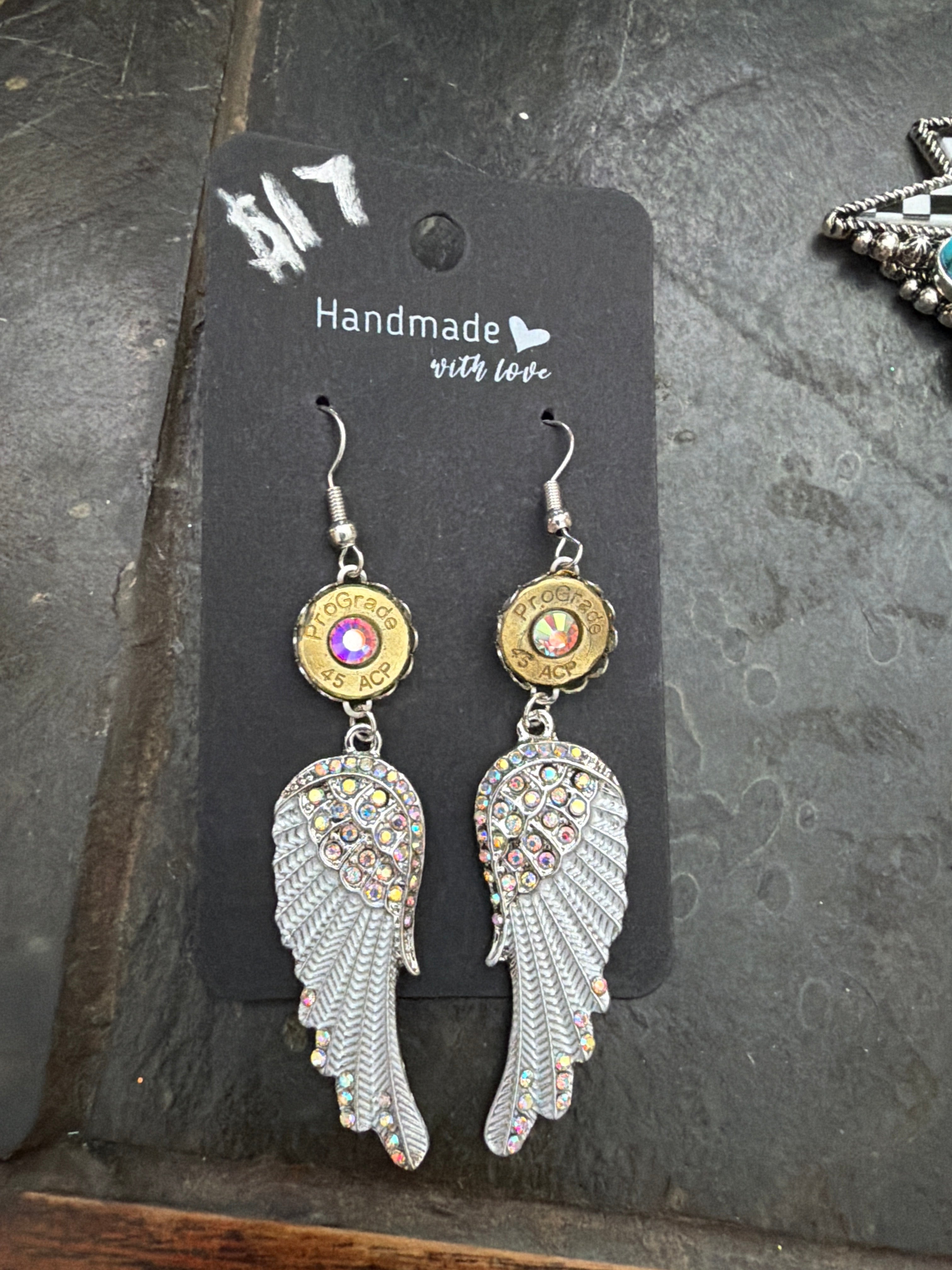 White wing earrings